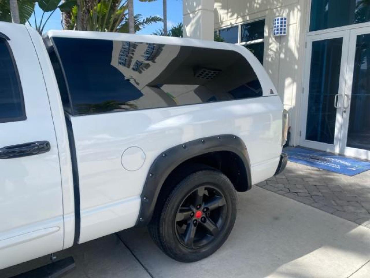 2007 Bright White /Medium Slate Gray Dodge Ram 1500 SLT CREW CAB CAMPER TOP 5.7 V8 (1D7HA182X7S) with an 5.7L V8 Hemi Multi-Displacement Engine engine, Automatic transmission, located at 4701 North Dixie Hwy, Pompano Beach, FL, 33064, (954) 422-2889, 26.240938, -80.123474 - OUR WEBPAGE FLORIDACARS1.COM HAS OVER 100 PHOTOS AND FREE CARFAX LINK 2007 Dodge Ram 1500 SLT 8 FT CREW CAB FIBER GLASS CAMPER TOP 4 Door Extended Cab Pickup 5.7L V8 F 16V Gasoline 19 MPG Rear Wheel Drive Features 20 Inch Plus Wheels ABS Brakes Air Conditioning Alloy Wheels AM/FM Stereo Automatic Tr- Photo#82