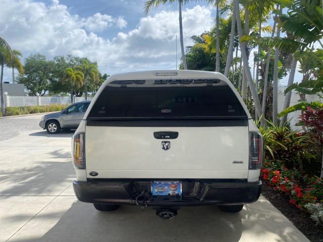 2007 Bright White /Medium Slate Gray Dodge Ram 1500 SLT CREW CAB CAMPER TOP 5.7 V8 (1D7HA182X7S) with an 5.7L V8 Hemi Multi-Displacement Engine engine, Automatic transmission, located at 4701 North Dixie Hwy, Pompano Beach, FL, 33064, (954) 422-2889, 26.240938, -80.123474 - OUR WEBPAGE FLORIDACARS1.COM HAS OVER 100 PHOTOS AND FREE CARFAX LINK 2007 Dodge Ram 1500 SLT 8 FT CREW CAB FIBER GLASS CAMPER TOP 4 Door Extended Cab Pickup 5.7L V8 F 16V Gasoline 19 MPG Rear Wheel Drive Features 20 Inch Plus Wheels ABS Brakes Air Conditioning Alloy Wheels AM/FM Stereo Automatic Tr - Photo#89