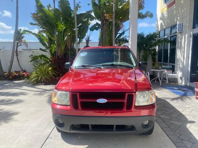 2003 Red Fire Metallic /Medium Flint Ford Explorer Sport Trac XLT LOW MILES 59,213 (1FMZU67E23U) with an 4.0L SOHC MPFI V6 Engine engine, Automatic transmission, located at 4701 North Dixie Hwy, Pompano Beach, FL, 33064, (954) 422-2889, 26.240938, -80.123474 - OUR WEBPAGE FLORIDACARS1.COM HAS OVER 100 PHOTOS AND FREE CARFAX LINK 2003 Ford Explorer Sport Trac XLT Sport Pickup 4.0L V6 F SOHC Gasoline 21 MPG Rear Wheel Drive Features ABS Brakes Air Conditioning Alloy Wheels AM/FM Stereo Automatic Transmission Bed Cover Bed Liner CD Audio Cloth Seats Cruise C - Photo#2