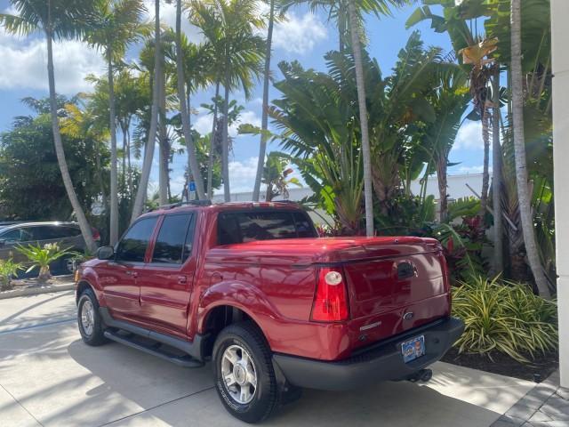 2003 Red Fire Metallic /Medium Flint Ford Explorer Sport Trac XLT LOW MILES 59,213 (1FMZU67E23U) with an 4.0L SOHC MPFI V6 Engine engine, Automatic transmission, located at 4701 North Dixie Hwy, Pompano Beach, FL, 33064, (954) 422-2889, 26.240938, -80.123474 - OUR WEBPAGE FLORIDACARS1.COM HAS OVER 100 PHOTOS AND FREE CARFAX LINK 2003 Ford Explorer Sport Trac XLT Sport Pickup 4.0L V6 F SOHC Gasoline 21 MPG Rear Wheel Drive Features ABS Brakes Air Conditioning Alloy Wheels AM/FM Stereo Automatic Transmission Bed Cover Bed Liner CD Audio Cloth Seats Cruise C - Photo#5