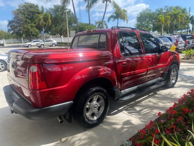 2003 Red Fire Metallic /Medium Flint Ford Explorer Sport Trac XLT LOW MILES 59,213 (1FMZU67E23U) with an 4.0L SOHC MPFI V6 Engine engine, Automatic transmission, located at 4701 North Dixie Hwy, Pompano Beach, FL, 33064, (954) 422-2889, 26.240938, -80.123474 - OUR WEBPAGE FLORIDACARS1.COM HAS OVER 100 PHOTOS AND FREE CARFAX LINK 2003 Ford Explorer Sport Trac XLT Sport Pickup 4.0L V6 F SOHC Gasoline 21 MPG Rear Wheel Drive Features ABS Brakes Air Conditioning Alloy Wheels AM/FM Stereo Automatic Transmission Bed Cover Bed Liner CD Audio Cloth Seats Cruise C - Photo#7