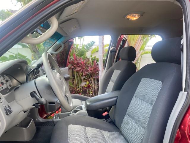 2003 Red Fire Metallic /Medium Flint Ford Explorer Sport Trac XLT LOW MILES 59,213 (1FMZU67E23U) with an 4.0L SOHC MPFI V6 Engine engine, Automatic transmission, located at 4701 North Dixie Hwy, Pompano Beach, FL, 33064, (954) 422-2889, 26.240938, -80.123474 - OUR WEBPAGE FLORIDACARS1.COM HAS OVER 100 PHOTOS AND FREE CARFAX LINK 2003 Ford Explorer Sport Trac XLT Sport Pickup 4.0L V6 F SOHC Gasoline 21 MPG Rear Wheel Drive Features ABS Brakes Air Conditioning Alloy Wheels AM/FM Stereo Automatic Transmission Bed Cover Bed Liner CD Audio Cloth Seats Cruise C - Photo#10