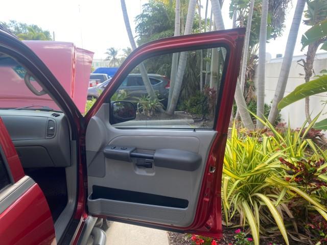 2003 Red Fire Metallic /Medium Flint Ford Explorer Sport Trac XLT LOW MILES 59,213 (1FMZU67E23U) with an 4.0L SOHC MPFI V6 Engine engine, Automatic transmission, located at 4701 North Dixie Hwy, Pompano Beach, FL, 33064, (954) 422-2889, 26.240938, -80.123474 - OUR WEBPAGE FLORIDACARS1.COM HAS OVER 100 PHOTOS AND FREE CARFAX LINK 2003 Ford Explorer Sport Trac XLT Sport Pickup 4.0L V6 F SOHC Gasoline 21 MPG Rear Wheel Drive Features ABS Brakes Air Conditioning Alloy Wheels AM/FM Stereo Automatic Transmission Bed Cover Bed Liner CD Audio Cloth Seats Cruise C - Photo#11