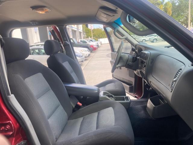 2003 Red Fire Metallic /Medium Flint Ford Explorer Sport Trac XLT LOW MILES 59,213 (1FMZU67E23U) with an 4.0L SOHC MPFI V6 Engine engine, Automatic transmission, located at 4701 North Dixie Hwy, Pompano Beach, FL, 33064, (954) 422-2889, 26.240938, -80.123474 - OUR WEBPAGE FLORIDACARS1.COM HAS OVER 100 PHOTOS AND FREE CARFAX LINK 2003 Ford Explorer Sport Trac XLT Sport Pickup 4.0L V6 F SOHC Gasoline 21 MPG Rear Wheel Drive Features ABS Brakes Air Conditioning Alloy Wheels AM/FM Stereo Automatic Transmission Bed Cover Bed Liner CD Audio Cloth Seats Cruise C - Photo#12