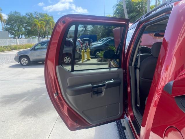 2003 Red Fire Metallic /Medium Flint Ford Explorer Sport Trac XLT LOW MILES 59,213 (1FMZU67E23U) with an 4.0L SOHC MPFI V6 Engine engine, Automatic transmission, located at 4701 North Dixie Hwy, Pompano Beach, FL, 33064, (954) 422-2889, 26.240938, -80.123474 - OUR WEBPAGE FLORIDACARS1.COM HAS OVER 100 PHOTOS AND FREE CARFAX LINK 2003 Ford Explorer Sport Trac XLT Sport Pickup 4.0L V6 F SOHC Gasoline 21 MPG Rear Wheel Drive Features ABS Brakes Air Conditioning Alloy Wheels AM/FM Stereo Automatic Transmission Bed Cover Bed Liner CD Audio Cloth Seats Cruise C - Photo#13