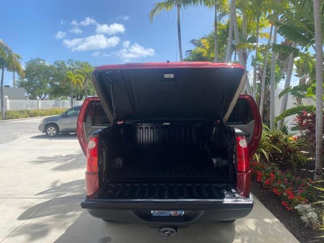 2003 Red Fire Metallic /Medium Flint Ford Explorer Sport Trac XLT LOW MILES 59,213 (1FMZU67E23U) with an 4.0L SOHC MPFI V6 Engine engine, Automatic transmission, located at 4701 North Dixie Hwy, Pompano Beach, FL, 33064, (954) 422-2889, 26.240938, -80.123474 - OUR WEBPAGE FLORIDACARS1.COM HAS OVER 100 PHOTOS AND FREE CARFAX LINK 2003 Ford Explorer Sport Trac XLT Sport Pickup 4.0L V6 F SOHC Gasoline 21 MPG Rear Wheel Drive Features ABS Brakes Air Conditioning Alloy Wheels AM/FM Stereo Automatic Transmission Bed Cover Bed Liner CD Audio Cloth Seats Cruise C - Photo#15