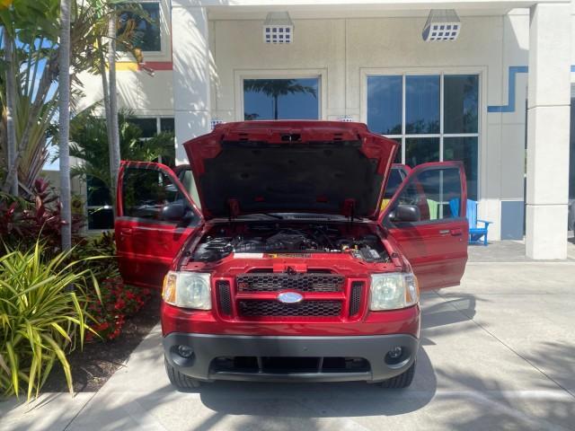 2003 Red Fire Metallic /Medium Flint Ford Explorer Sport Trac XLT LOW MILES 59,213 (1FMZU67E23U) with an 4.0L SOHC MPFI V6 Engine engine, Automatic transmission, located at 4701 North Dixie Hwy, Pompano Beach, FL, 33064, (954) 422-2889, 26.240938, -80.123474 - OUR WEBPAGE FLORIDACARS1.COM HAS OVER 100 PHOTOS AND FREE CARFAX LINK 2003 Ford Explorer Sport Trac XLT Sport Pickup 4.0L V6 F SOHC Gasoline 21 MPG Rear Wheel Drive Features ABS Brakes Air Conditioning Alloy Wheels AM/FM Stereo Automatic Transmission Bed Cover Bed Liner CD Audio Cloth Seats Cruise C - Photo#16