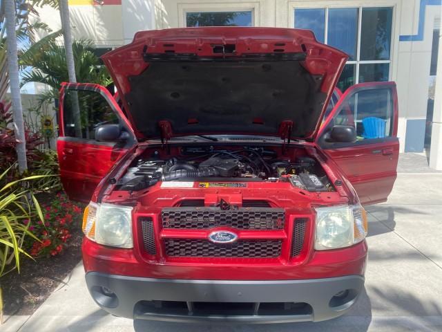 2003 Red Fire Metallic /Medium Flint Ford Explorer Sport Trac XLT LOW MILES 59,213 (1FMZU67E23U) with an 4.0L SOHC MPFI V6 Engine engine, Automatic transmission, located at 4701 North Dixie Hwy, Pompano Beach, FL, 33064, (954) 422-2889, 26.240938, -80.123474 - OUR WEBPAGE FLORIDACARS1.COM HAS OVER 100 PHOTOS AND FREE CARFAX LINK 2003 Ford Explorer Sport Trac XLT Sport Pickup 4.0L V6 F SOHC Gasoline 21 MPG Rear Wheel Drive Features ABS Brakes Air Conditioning Alloy Wheels AM/FM Stereo Automatic Transmission Bed Cover Bed Liner CD Audio Cloth Seats Cruise C - Photo#17