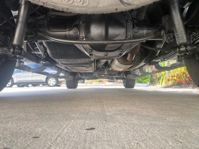 2003 Red Fire Metallic /Medium Flint Ford Explorer Sport Trac XLT LOW MILES 59,213 (1FMZU67E23U) with an 4.0L SOHC MPFI V6 Engine engine, Automatic transmission, located at 4701 North Dixie Hwy, Pompano Beach, FL, 33064, (954) 422-2889, 26.240938, -80.123474 - OUR WEBPAGE FLORIDACARS1.COM HAS OVER 100 PHOTOS AND FREE CARFAX LINK 2003 Ford Explorer Sport Trac XLT Sport Pickup 4.0L V6 F SOHC Gasoline 21 MPG Rear Wheel Drive Features ABS Brakes Air Conditioning Alloy Wheels AM/FM Stereo Automatic Transmission Bed Cover Bed Liner CD Audio Cloth Seats Cruise C - Photo#22