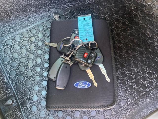 2003 Red Fire Metallic /Medium Flint Ford Explorer Sport Trac XLT LOW MILES 59,213 (1FMZU67E23U) with an 4.0L SOHC MPFI V6 Engine engine, Automatic transmission, located at 4701 North Dixie Hwy, Pompano Beach, FL, 33064, (954) 422-2889, 26.240938, -80.123474 - OUR WEBPAGE FLORIDACARS1.COM HAS OVER 100 PHOTOS AND FREE CARFAX LINK 2003 Ford Explorer Sport Trac XLT Sport Pickup 4.0L V6 F SOHC Gasoline 21 MPG Rear Wheel Drive Features ABS Brakes Air Conditioning Alloy Wheels AM/FM Stereo Automatic Transmission Bed Cover Bed Liner CD Audio Cloth Seats Cruise C - Photo#23