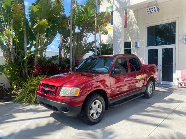 2003 Red Fire Metallic /Medium Flint Ford Explorer Sport Trac XLT LOW MILES 59,213 (1FMZU67E23U) with an 4.0L SOHC MPFI V6 Engine engine, Automatic transmission, located at 4701 North Dixie Hwy, Pompano Beach, FL, 33064, (954) 422-2889, 26.240938, -80.123474 - OUR WEBPAGE FLORIDACARS1.COM HAS OVER 100 PHOTOS AND FREE CARFAX LINK 2003 Ford Explorer Sport Trac XLT Sport Pickup 4.0L V6 F SOHC Gasoline 21 MPG Rear Wheel Drive Features ABS Brakes Air Conditioning Alloy Wheels AM/FM Stereo Automatic Transmission Bed Cover Bed Liner CD Audio Cloth Seats Cruise C - Photo#28