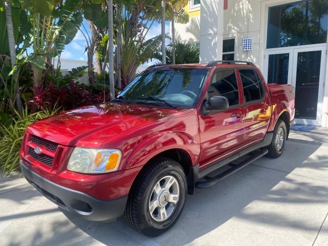 2003 Red Fire Metallic /Medium Flint Ford Explorer Sport Trac XLT LOW MILES 59,213 (1FMZU67E23U) with an 4.0L SOHC MPFI V6 Engine engine, Automatic transmission, located at 4701 North Dixie Hwy, Pompano Beach, FL, 33064, (954) 422-2889, 26.240938, -80.123474 - OUR WEBPAGE FLORIDACARS1.COM HAS OVER 100 PHOTOS AND FREE CARFAX LINK 2003 Ford Explorer Sport Trac XLT Sport Pickup 4.0L V6 F SOHC Gasoline 21 MPG Rear Wheel Drive Features ABS Brakes Air Conditioning Alloy Wheels AM/FM Stereo Automatic Transmission Bed Cover Bed Liner CD Audio Cloth Seats Cruise C - Photo#29