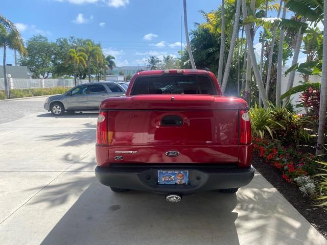 2003 Red Fire Metallic /Medium Flint Ford Explorer Sport Trac XLT LOW MILES 59,213 (1FMZU67E23U) with an 4.0L SOHC MPFI V6 Engine engine, Automatic transmission, located at 4701 North Dixie Hwy, Pompano Beach, FL, 33064, (954) 422-2889, 26.240938, -80.123474 - OUR WEBPAGE FLORIDACARS1.COM HAS OVER 100 PHOTOS AND FREE CARFAX LINK 2003 Ford Explorer Sport Trac XLT Sport Pickup 4.0L V6 F SOHC Gasoline 21 MPG Rear Wheel Drive Features ABS Brakes Air Conditioning Alloy Wheels AM/FM Stereo Automatic Transmission Bed Cover Bed Liner CD Audio Cloth Seats Cruise C - Photo#34