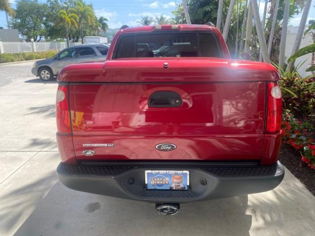 2003 Red Fire Metallic /Medium Flint Ford Explorer Sport Trac XLT LOW MILES 59,213 (1FMZU67E23U) with an 4.0L SOHC MPFI V6 Engine engine, Automatic transmission, located at 4701 North Dixie Hwy, Pompano Beach, FL, 33064, (954) 422-2889, 26.240938, -80.123474 - OUR WEBPAGE FLORIDACARS1.COM HAS OVER 100 PHOTOS AND FREE CARFAX LINK 2003 Ford Explorer Sport Trac XLT Sport Pickup 4.0L V6 F SOHC Gasoline 21 MPG Rear Wheel Drive Features ABS Brakes Air Conditioning Alloy Wheels AM/FM Stereo Automatic Transmission Bed Cover Bed Liner CD Audio Cloth Seats Cruise C - Photo#35