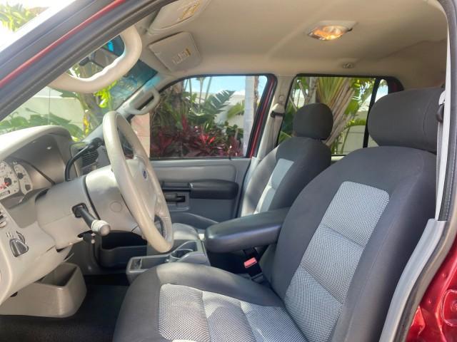 2003 Red Fire Metallic /Medium Flint Ford Explorer Sport Trac XLT LOW MILES 59,213 (1FMZU67E23U) with an 4.0L SOHC MPFI V6 Engine engine, Automatic transmission, located at 4701 North Dixie Hwy, Pompano Beach, FL, 33064, (954) 422-2889, 26.240938, -80.123474 - OUR WEBPAGE FLORIDACARS1.COM HAS OVER 100 PHOTOS AND FREE CARFAX LINK 2003 Ford Explorer Sport Trac XLT Sport Pickup 4.0L V6 F SOHC Gasoline 21 MPG Rear Wheel Drive Features ABS Brakes Air Conditioning Alloy Wheels AM/FM Stereo Automatic Transmission Bed Cover Bed Liner CD Audio Cloth Seats Cruise C - Photo#45