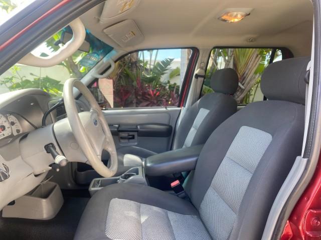 2003 Red Fire Metallic /Medium Flint Ford Explorer Sport Trac XLT LOW MILES 59,213 (1FMZU67E23U) with an 4.0L SOHC MPFI V6 Engine engine, Automatic transmission, located at 4701 North Dixie Hwy, Pompano Beach, FL, 33064, (954) 422-2889, 26.240938, -80.123474 - OUR WEBPAGE FLORIDACARS1.COM HAS OVER 100 PHOTOS AND FREE CARFAX LINK 2003 Ford Explorer Sport Trac XLT Sport Pickup 4.0L V6 F SOHC Gasoline 21 MPG Rear Wheel Drive Features ABS Brakes Air Conditioning Alloy Wheels AM/FM Stereo Automatic Transmission Bed Cover Bed Liner CD Audio Cloth Seats Cruise C - Photo#46