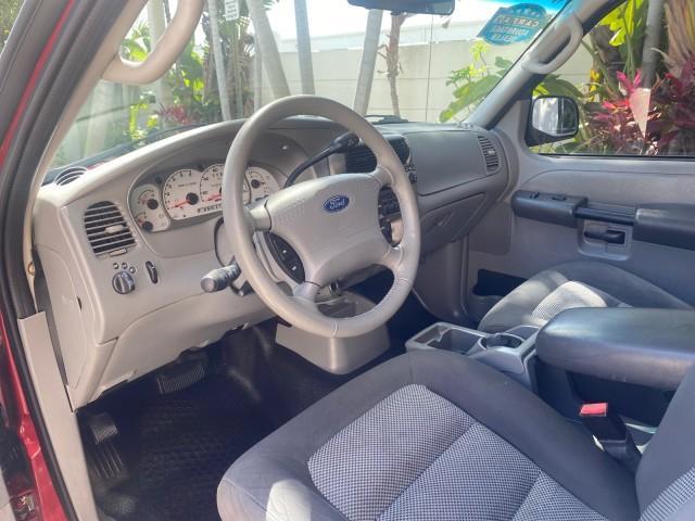 2003 Red Fire Metallic /Medium Flint Ford Explorer Sport Trac XLT LOW MILES 59,213 (1FMZU67E23U) with an 4.0L SOHC MPFI V6 Engine engine, Automatic transmission, located at 4701 North Dixie Hwy, Pompano Beach, FL, 33064, (954) 422-2889, 26.240938, -80.123474 - OUR WEBPAGE FLORIDACARS1.COM HAS OVER 100 PHOTOS AND FREE CARFAX LINK 2003 Ford Explorer Sport Trac XLT Sport Pickup 4.0L V6 F SOHC Gasoline 21 MPG Rear Wheel Drive Features ABS Brakes Air Conditioning Alloy Wheels AM/FM Stereo Automatic Transmission Bed Cover Bed Liner CD Audio Cloth Seats Cruise C - Photo#50
