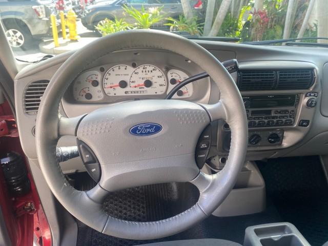 2003 Red Fire Metallic /Medium Flint Ford Explorer Sport Trac XLT LOW MILES 59,213 (1FMZU67E23U) with an 4.0L SOHC MPFI V6 Engine engine, Automatic transmission, located at 4701 North Dixie Hwy, Pompano Beach, FL, 33064, (954) 422-2889, 26.240938, -80.123474 - OUR WEBPAGE FLORIDACARS1.COM HAS OVER 100 PHOTOS AND FREE CARFAX LINK 2003 Ford Explorer Sport Trac XLT Sport Pickup 4.0L V6 F SOHC Gasoline 21 MPG Rear Wheel Drive Features ABS Brakes Air Conditioning Alloy Wheels AM/FM Stereo Automatic Transmission Bed Cover Bed Liner CD Audio Cloth Seats Cruise C - Photo#51