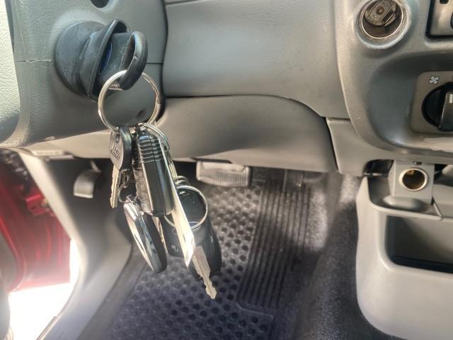 2003 Red Fire Metallic /Medium Flint Ford Explorer Sport Trac XLT LOW MILES 59,213 (1FMZU67E23U) with an 4.0L SOHC MPFI V6 Engine engine, Automatic transmission, located at 4701 North Dixie Hwy, Pompano Beach, FL, 33064, (954) 422-2889, 26.240938, -80.123474 - OUR WEBPAGE FLORIDACARS1.COM HAS OVER 100 PHOTOS AND FREE CARFAX LINK 2003 Ford Explorer Sport Trac XLT Sport Pickup 4.0L V6 F SOHC Gasoline 21 MPG Rear Wheel Drive Features ABS Brakes Air Conditioning Alloy Wheels AM/FM Stereo Automatic Transmission Bed Cover Bed Liner CD Audio Cloth Seats Cruise C - Photo#57