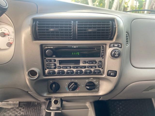 2003 Red Fire Metallic /Medium Flint Ford Explorer Sport Trac XLT LOW MILES 59,213 (1FMZU67E23U) with an 4.0L SOHC MPFI V6 Engine engine, Automatic transmission, located at 4701 North Dixie Hwy, Pompano Beach, FL, 33064, (954) 422-2889, 26.240938, -80.123474 - OUR WEBPAGE FLORIDACARS1.COM HAS OVER 100 PHOTOS AND FREE CARFAX LINK 2003 Ford Explorer Sport Trac XLT Sport Pickup 4.0L V6 F SOHC Gasoline 21 MPG Rear Wheel Drive Features ABS Brakes Air Conditioning Alloy Wheels AM/FM Stereo Automatic Transmission Bed Cover Bed Liner CD Audio Cloth Seats Cruise C - Photo#58