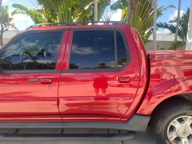 2003 Red Fire Metallic /Medium Flint Ford Explorer Sport Trac XLT LOW MILES 59,213 (1FMZU67E23U) with an 4.0L SOHC MPFI V6 Engine engine, Automatic transmission, located at 4701 North Dixie Hwy, Pompano Beach, FL, 33064, (954) 422-2889, 26.240938, -80.123474 - OUR WEBPAGE FLORIDACARS1.COM HAS OVER 100 PHOTOS AND FREE CARFAX LINK 2003 Ford Explorer Sport Trac XLT Sport Pickup 4.0L V6 F SOHC Gasoline 21 MPG Rear Wheel Drive Features ABS Brakes Air Conditioning Alloy Wheels AM/FM Stereo Automatic Transmission Bed Cover Bed Liner CD Audio Cloth Seats Cruise C - Photo#72