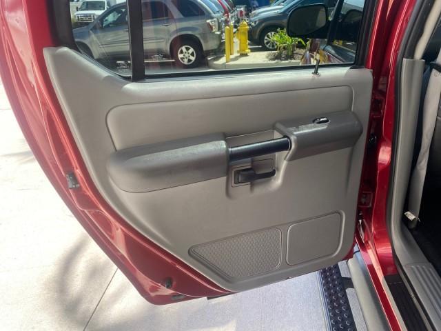 2003 Red Fire Metallic /Medium Flint Ford Explorer Sport Trac XLT LOW MILES 59,213 (1FMZU67E23U) with an 4.0L SOHC MPFI V6 Engine engine, Automatic transmission, located at 4701 North Dixie Hwy, Pompano Beach, FL, 33064, (954) 422-2889, 26.240938, -80.123474 - OUR WEBPAGE FLORIDACARS1.COM HAS OVER 100 PHOTOS AND FREE CARFAX LINK 2003 Ford Explorer Sport Trac XLT Sport Pickup 4.0L V6 F SOHC Gasoline 21 MPG Rear Wheel Drive Features ABS Brakes Air Conditioning Alloy Wheels AM/FM Stereo Automatic Transmission Bed Cover Bed Liner CD Audio Cloth Seats Cruise C - Photo#74
