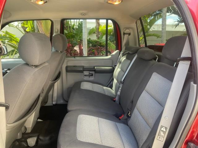 2003 Red Fire Metallic /Medium Flint Ford Explorer Sport Trac XLT LOW MILES 59,213 (1FMZU67E23U) with an 4.0L SOHC MPFI V6 Engine engine, Automatic transmission, located at 4701 North Dixie Hwy, Pompano Beach, FL, 33064, (954) 422-2889, 26.240938, -80.123474 - OUR WEBPAGE FLORIDACARS1.COM HAS OVER 100 PHOTOS AND FREE CARFAX LINK 2003 Ford Explorer Sport Trac XLT Sport Pickup 4.0L V6 F SOHC Gasoline 21 MPG Rear Wheel Drive Features ABS Brakes Air Conditioning Alloy Wheels AM/FM Stereo Automatic Transmission Bed Cover Bed Liner CD Audio Cloth Seats Cruise C - Photo#75