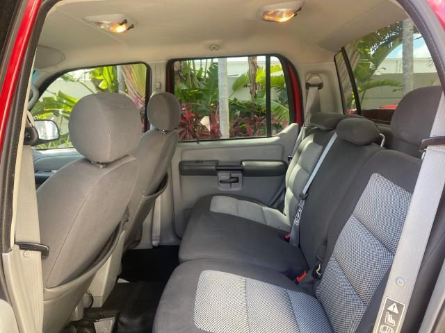 2003 Red Fire Metallic /Medium Flint Ford Explorer Sport Trac XLT LOW MILES 59,213 (1FMZU67E23U) with an 4.0L SOHC MPFI V6 Engine engine, Automatic transmission, located at 4701 North Dixie Hwy, Pompano Beach, FL, 33064, (954) 422-2889, 26.240938, -80.123474 - OUR WEBPAGE FLORIDACARS1.COM HAS OVER 100 PHOTOS AND FREE CARFAX LINK 2003 Ford Explorer Sport Trac XLT Sport Pickup 4.0L V6 F SOHC Gasoline 21 MPG Rear Wheel Drive Features ABS Brakes Air Conditioning Alloy Wheels AM/FM Stereo Automatic Transmission Bed Cover Bed Liner CD Audio Cloth Seats Cruise C - Photo#76