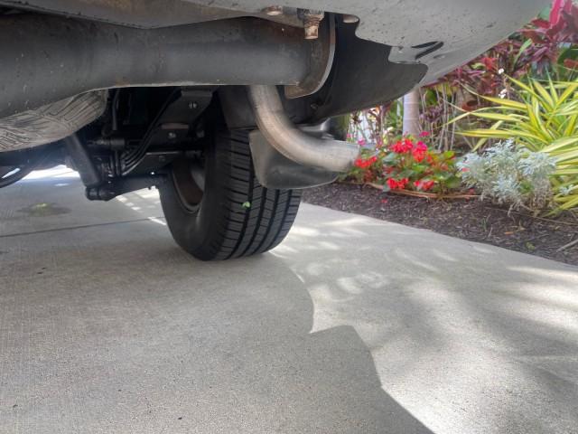 2003 Red Fire Metallic /Medium Flint Ford Explorer Sport Trac XLT LOW MILES 59,213 (1FMZU67E23U) with an 4.0L SOHC MPFI V6 Engine engine, Automatic transmission, located at 4701 North Dixie Hwy, Pompano Beach, FL, 33064, (954) 422-2889, 26.240938, -80.123474 - OUR WEBPAGE FLORIDACARS1.COM HAS OVER 100 PHOTOS AND FREE CARFAX LINK 2003 Ford Explorer Sport Trac XLT Sport Pickup 4.0L V6 F SOHC Gasoline 21 MPG Rear Wheel Drive Features ABS Brakes Air Conditioning Alloy Wheels AM/FM Stereo Automatic Transmission Bed Cover Bed Liner CD Audio Cloth Seats Cruise C - Photo#93