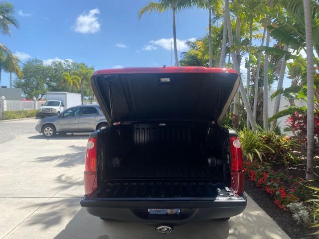 2003 Red Fire Metallic /Medium Flint Ford Explorer Sport Trac XLT LOW MILES 59,213 (1FMZU67E23U) with an 4.0L SOHC MPFI V6 Engine engine, Automatic transmission, located at 4701 North Dixie Hwy, Pompano Beach, FL, 33064, (954) 422-2889, 26.240938, -80.123474 - OUR WEBPAGE FLORIDACARS1.COM HAS OVER 100 PHOTOS AND FREE CARFAX LINK 2003 Ford Explorer Sport Trac XLT Sport Pickup 4.0L V6 F SOHC Gasoline 21 MPG Rear Wheel Drive Features ABS Brakes Air Conditioning Alloy Wheels AM/FM Stereo Automatic Transmission Bed Cover Bed Liner CD Audio Cloth Seats Cruise C - Photo#94