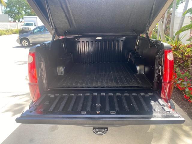 2003 Red Fire Metallic /Medium Flint Ford Explorer Sport Trac XLT LOW MILES 59,213 (1FMZU67E23U) with an 4.0L SOHC MPFI V6 Engine engine, Automatic transmission, located at 4701 North Dixie Hwy, Pompano Beach, FL, 33064, (954) 422-2889, 26.240938, -80.123474 - OUR WEBPAGE FLORIDACARS1.COM HAS OVER 100 PHOTOS AND FREE CARFAX LINK 2003 Ford Explorer Sport Trac XLT Sport Pickup 4.0L V6 F SOHC Gasoline 21 MPG Rear Wheel Drive Features ABS Brakes Air Conditioning Alloy Wheels AM/FM Stereo Automatic Transmission Bed Cover Bed Liner CD Audio Cloth Seats Cruise C - Photo#95