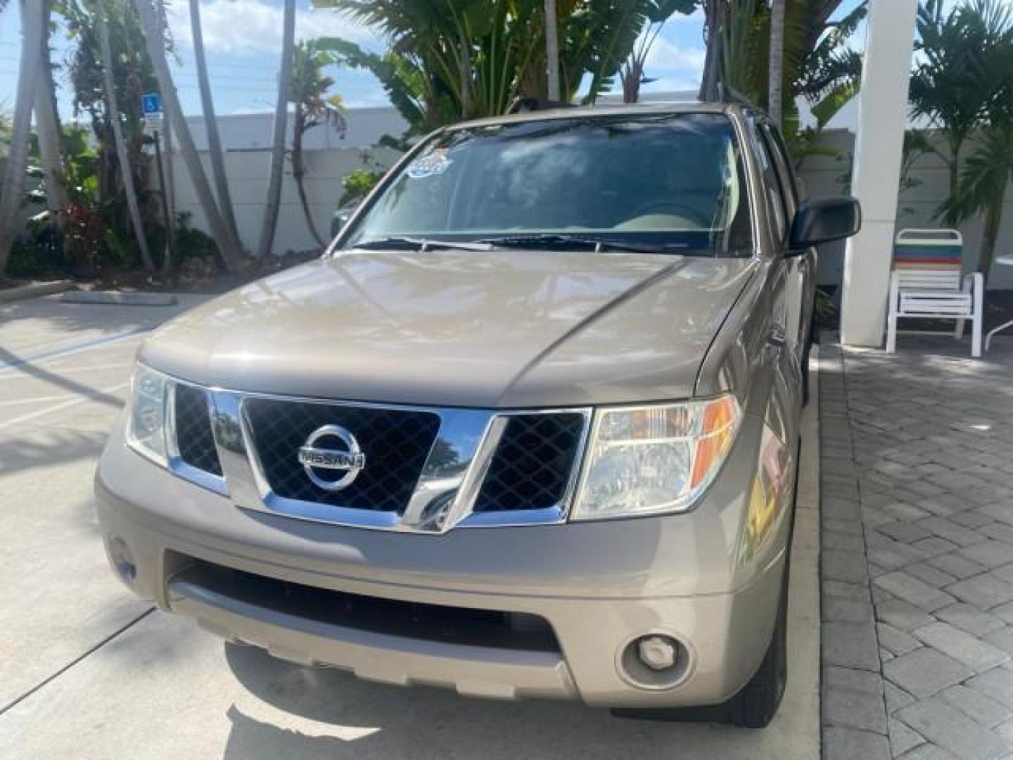 2007 Desert Stone Metallic /Desert Nissan Pathfinder S LOW MILES 64,259 1 OWNER (5N1AR18U97C) with an 4.0L DOHC SMPI 24-Valve V6 Engine engine, Automatic transmission, located at 4701 North Dixie Hwy, Pompano Beach, FL, 33064, (954) 422-2889, 26.240938, -80.123474 - OUR WEBPAGE FLORIDACARS1.COM HAS OVER 100 PHOTOS AND FREE CARFAX LINK 2007 Nissan Pathfinder S 1 OWNER 4 Door Wagon/Sport Utility 4.0L V6 F DOHC 24V Gasoline 23 MPG Rear Wheel Drive Features ABS Brakes Air Conditioning Alloy Wheels AM/FM Stereo Automatic Transmission Auxiliary Audio Input BOSE Sound- Photo#3