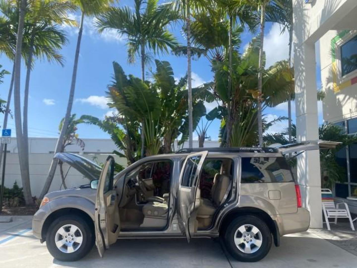2007 Desert Stone Metallic /Desert Nissan Pathfinder S LOW MILES 64,259 1 OWNER (5N1AR18U97C) with an 4.0L DOHC SMPI 24-Valve V6 Engine engine, Automatic transmission, located at 4701 North Dixie Hwy, Pompano Beach, FL, 33064, (954) 422-2889, 26.240938, -80.123474 - OUR WEBPAGE FLORIDACARS1.COM HAS OVER 100 PHOTOS AND FREE CARFAX LINK 2007 Nissan Pathfinder S 1 OWNER 4 Door Wagon/Sport Utility 4.0L V6 F DOHC 24V Gasoline 23 MPG Rear Wheel Drive Features ABS Brakes Air Conditioning Alloy Wheels AM/FM Stereo Automatic Transmission Auxiliary Audio Input BOSE Sound- Photo#8