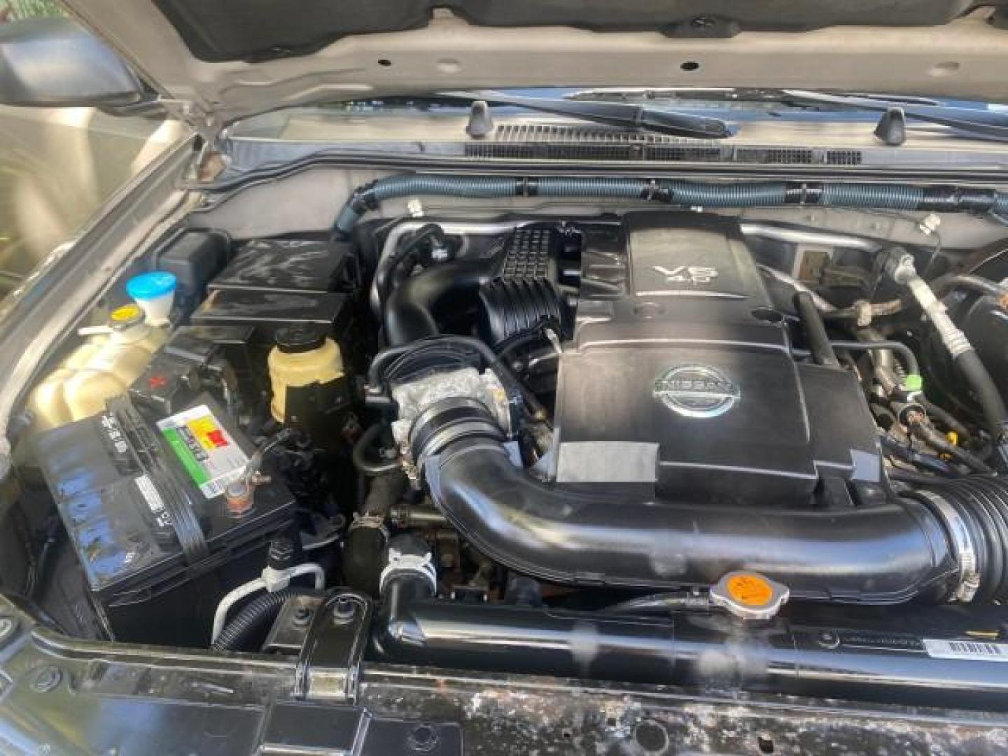 2007 Desert Stone Metallic /Desert Nissan Pathfinder S LOW MILES 64,259 1 OWNER (5N1AR18U97C) with an 4.0L DOHC SMPI 24-Valve V6 Engine engine, Automatic transmission, located at 4701 North Dixie Hwy, Pompano Beach, FL, 33064, (954) 422-2889, 26.240938, -80.123474 - OUR WEBPAGE FLORIDACARS1.COM HAS OVER 100 PHOTOS AND FREE CARFAX LINK 2007 Nissan Pathfinder S 1 OWNER 4 Door Wagon/Sport Utility 4.0L V6 F DOHC 24V Gasoline 23 MPG Rear Wheel Drive Features ABS Brakes Air Conditioning Alloy Wheels AM/FM Stereo Automatic Transmission Auxiliary Audio Input BOSE Sound- Photo#24
