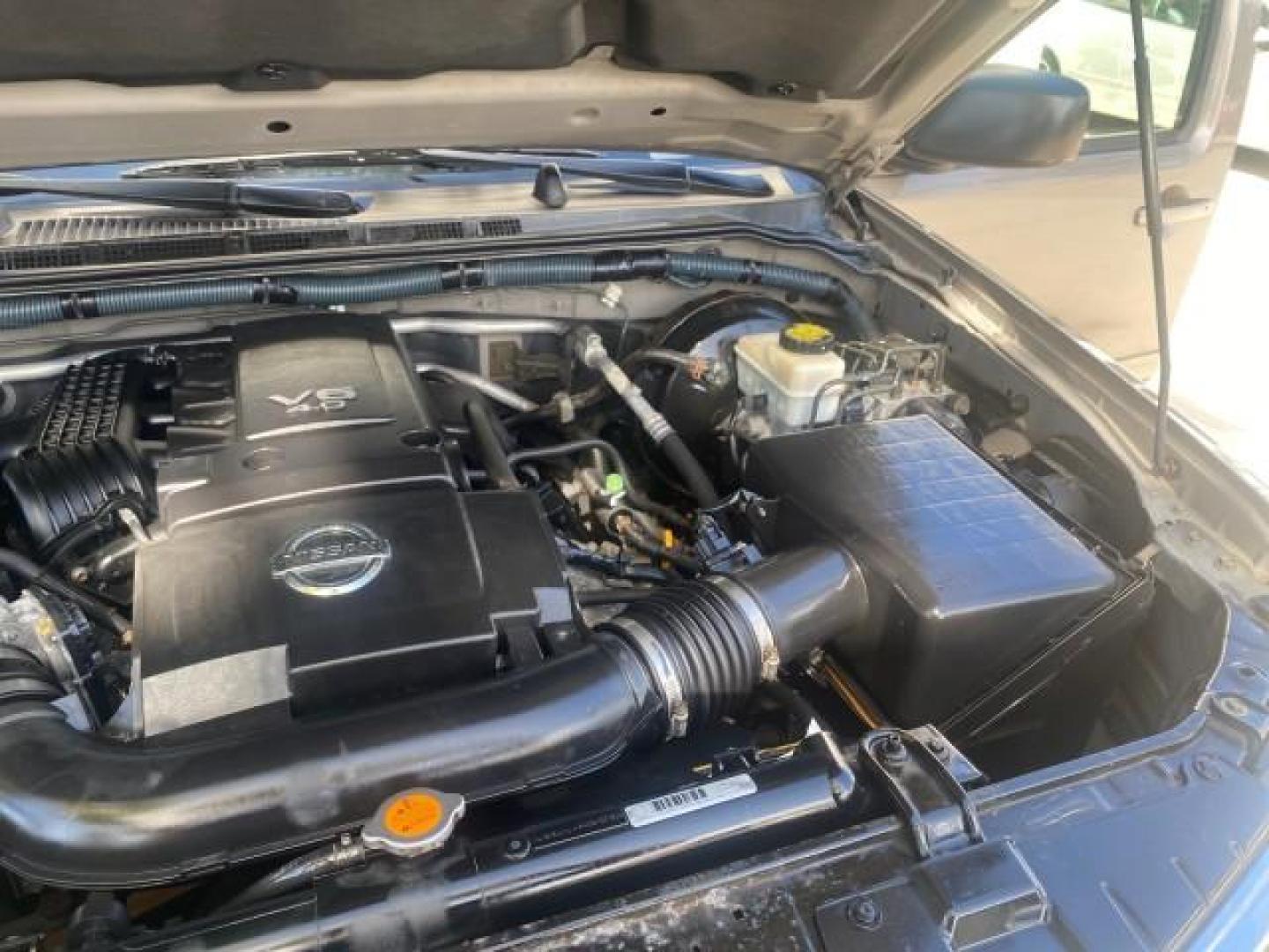 2007 Desert Stone Metallic /Desert Nissan Pathfinder S LOW MILES 64,259 1 OWNER (5N1AR18U97C) with an 4.0L DOHC SMPI 24-Valve V6 Engine engine, Automatic transmission, located at 4701 North Dixie Hwy, Pompano Beach, FL, 33064, (954) 422-2889, 26.240938, -80.123474 - OUR WEBPAGE FLORIDACARS1.COM HAS OVER 100 PHOTOS AND FREE CARFAX LINK 2007 Nissan Pathfinder S 1 OWNER 4 Door Wagon/Sport Utility 4.0L V6 F DOHC 24V Gasoline 23 MPG Rear Wheel Drive Features ABS Brakes Air Conditioning Alloy Wheels AM/FM Stereo Automatic Transmission Auxiliary Audio Input BOSE Sound- Photo#25