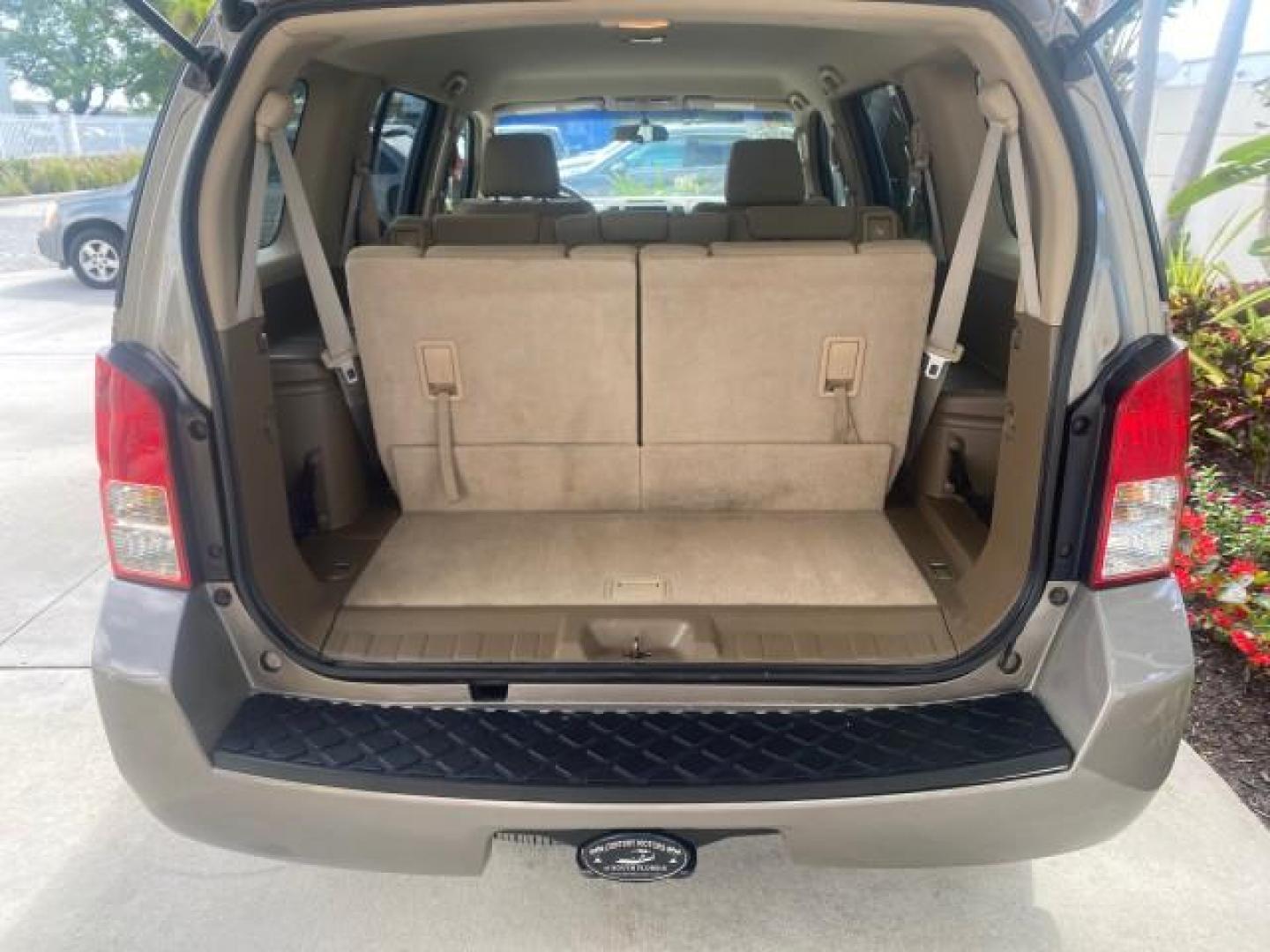 2007 Desert Stone Metallic /Desert Nissan Pathfinder S LOW MILES 64,259 1 OWNER (5N1AR18U97C) with an 4.0L DOHC SMPI 24-Valve V6 Engine engine, Automatic transmission, located at 4701 North Dixie Hwy, Pompano Beach, FL, 33064, (954) 422-2889, 26.240938, -80.123474 - OUR WEBPAGE FLORIDACARS1.COM HAS OVER 100 PHOTOS AND FREE CARFAX LINK 2007 Nissan Pathfinder S 1 OWNER 4 Door Wagon/Sport Utility 4.0L V6 F DOHC 24V Gasoline 23 MPG Rear Wheel Drive Features ABS Brakes Air Conditioning Alloy Wheels AM/FM Stereo Automatic Transmission Auxiliary Audio Input BOSE Sound- Photo#95