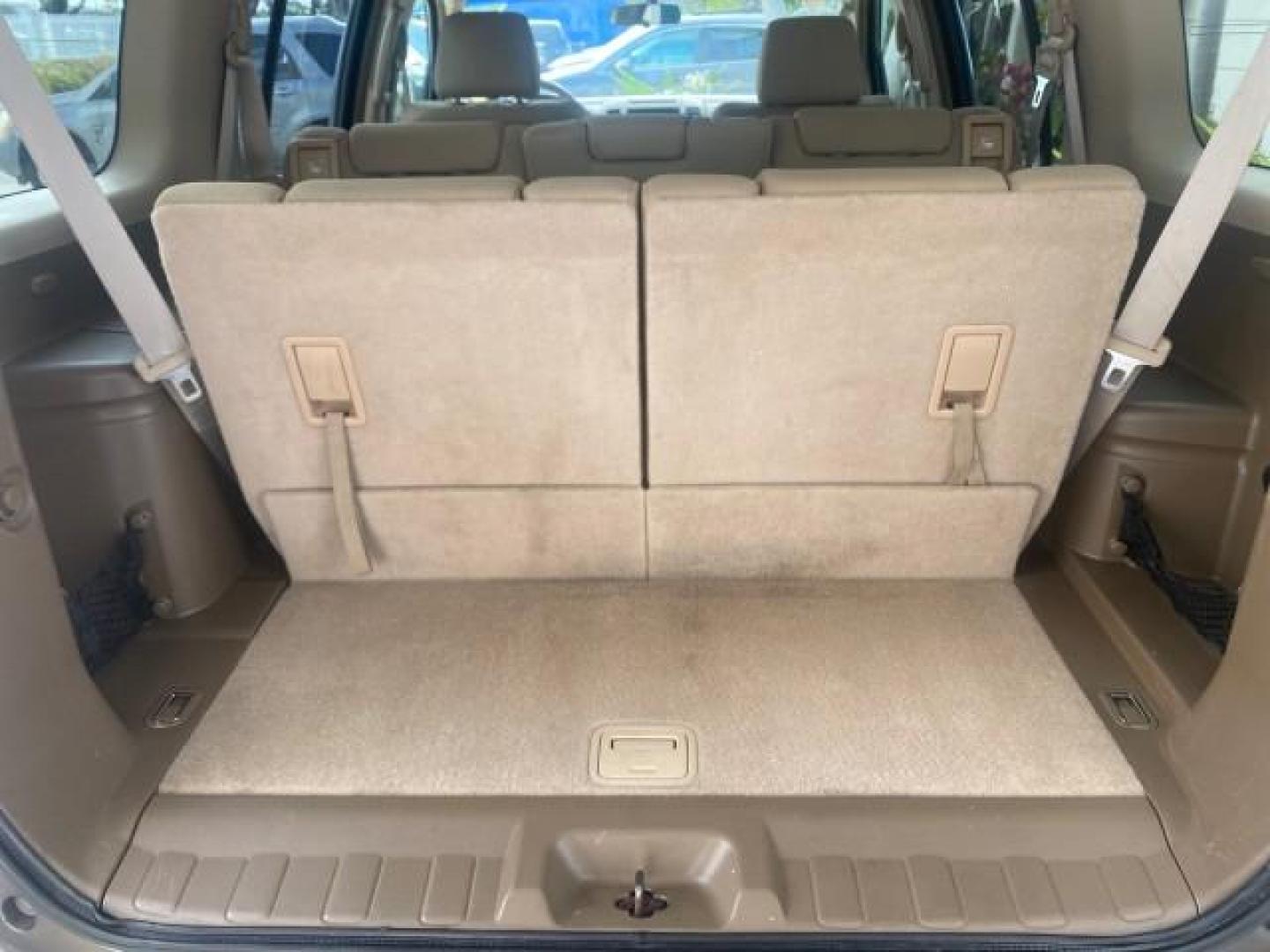 2007 Desert Stone Metallic /Desert Nissan Pathfinder S LOW MILES 64,259 1 OWNER (5N1AR18U97C) with an 4.0L DOHC SMPI 24-Valve V6 Engine engine, Automatic transmission, located at 4701 North Dixie Hwy, Pompano Beach, FL, 33064, (954) 422-2889, 26.240938, -80.123474 - OUR WEBPAGE FLORIDACARS1.COM HAS OVER 100 PHOTOS AND FREE CARFAX LINK 2007 Nissan Pathfinder S 1 OWNER 4 Door Wagon/Sport Utility 4.0L V6 F DOHC 24V Gasoline 23 MPG Rear Wheel Drive Features ABS Brakes Air Conditioning Alloy Wheels AM/FM Stereo Automatic Transmission Auxiliary Audio Input BOSE Sound- Photo#96