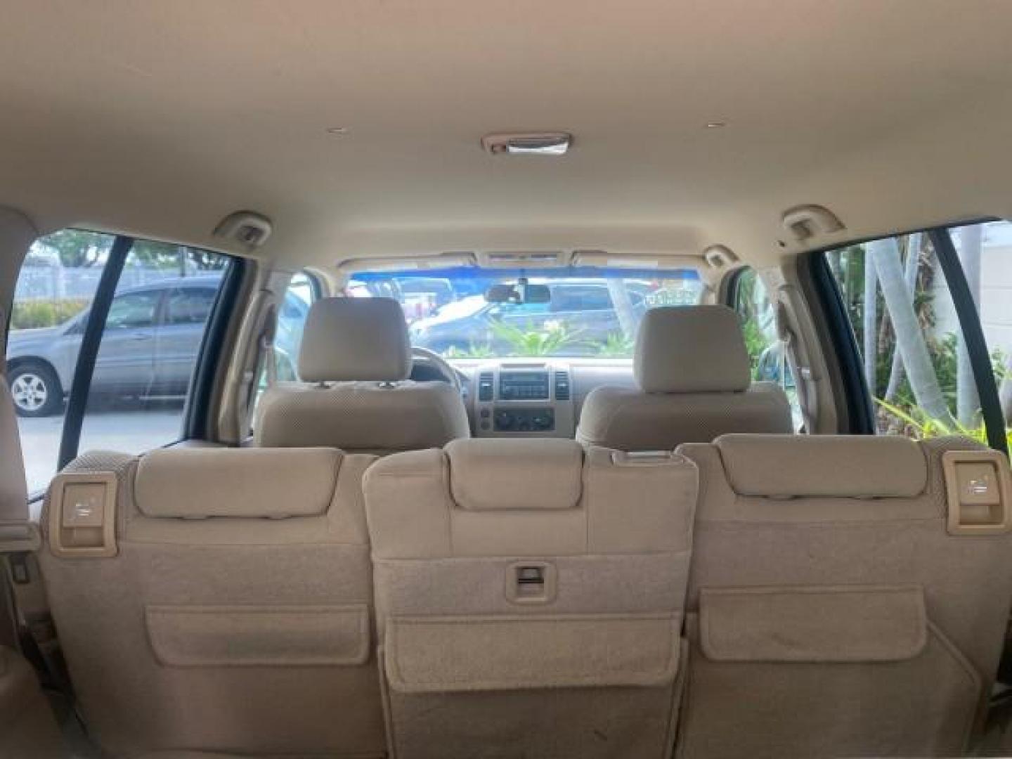 2007 Desert Stone Metallic /Desert Nissan Pathfinder S LOW MILES 64,259 1 OWNER (5N1AR18U97C) with an 4.0L DOHC SMPI 24-Valve V6 Engine engine, Automatic transmission, located at 4701 North Dixie Hwy, Pompano Beach, FL, 33064, (954) 422-2889, 26.240938, -80.123474 - OUR WEBPAGE FLORIDACARS1.COM HAS OVER 100 PHOTOS AND FREE CARFAX LINK 2007 Nissan Pathfinder S 1 OWNER 4 Door Wagon/Sport Utility 4.0L V6 F DOHC 24V Gasoline 23 MPG Rear Wheel Drive Features ABS Brakes Air Conditioning Alloy Wheels AM/FM Stereo Automatic Transmission Auxiliary Audio Input BOSE Sound- Photo#97