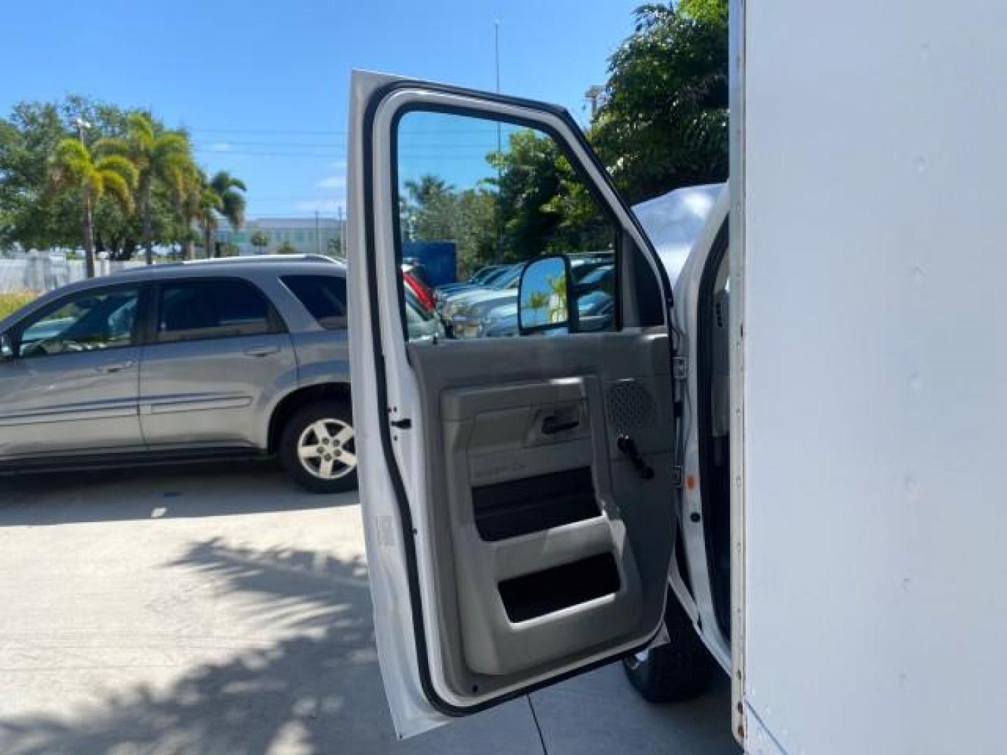 2013 Oxford White /Medium Flint Ford Econoline Commercial Cutaway 1 OWNER E 450 BOX TRUCK (1FDXE4FS4DD) with an 6.8L SOHC EFI Triton V10 Engine engine, Automatic transmission, located at 4701 North Dixie Hwy, Pompano Beach, FL, 33064, (954) 422-2889, 26.240938, -80.123474 - OUR WEBPAGE FLORIDACARS1.COM HAS OVER 100 PHOTOS AND FREE CARFAX LINK 2013 Ford Econoline Super Duty E-450 BOX TRUCK 1 OWNER 17 FT DUAL REAR WHEELS HEAVY DUTY POWER LIFT GATE VIN:1FDXE4FS4DDA91512 Cutaway 6.8L V10 F SOHC 20V Gasoline Rear Wheel Drive Features ABS Brakes Air Conditioning AM/FM Stereo - Photo#9