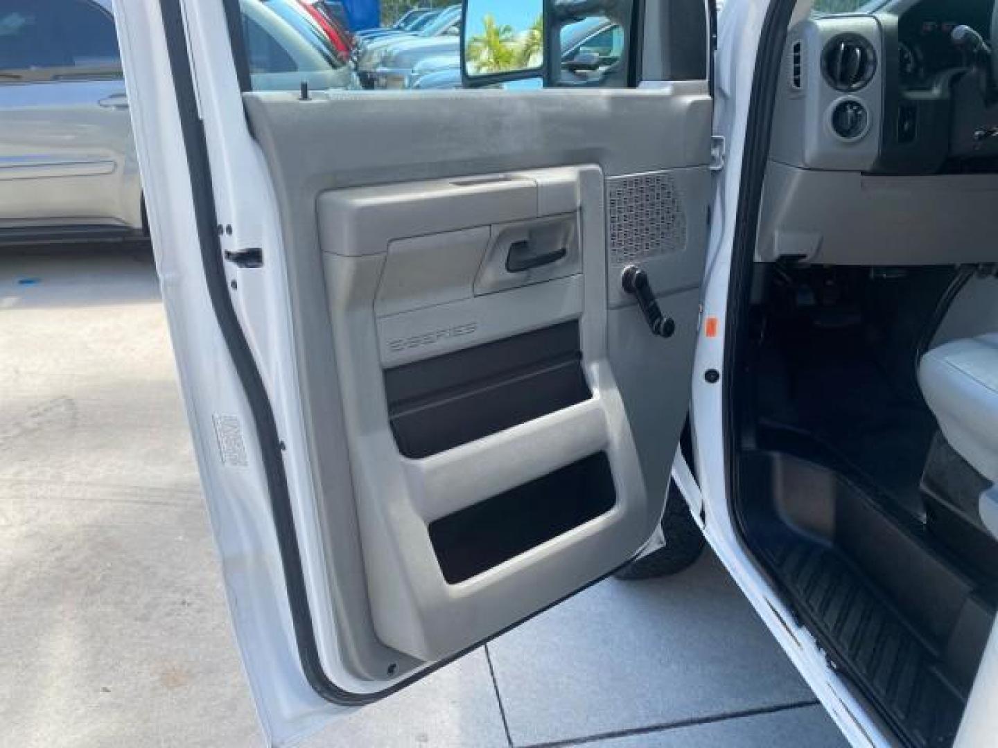 2013 Oxford White /Medium Flint Ford Econoline Commercial Cutaway 1 OWNER E 450 BOX TRUCK (1FDXE4FS4DD) with an 6.8L SOHC EFI Triton V10 Engine engine, Automatic transmission, located at 4701 North Dixie Hwy, Pompano Beach, FL, 33064, (954) 422-2889, 26.240938, -80.123474 - OUR WEBPAGE FLORIDACARS1.COM HAS OVER 100 PHOTOS AND FREE CARFAX LINK 2013 Ford Econoline Super Duty E-450 BOX TRUCK 1 OWNER 17 FT DUAL REAR WHEELS HEAVY DUTY POWER LIFT GATE VIN:1FDXE4FS4DDA91512 Cutaway 6.8L V10 F SOHC 20V Gasoline Rear Wheel Drive Features ABS Brakes Air Conditioning AM/FM Stereo - Photo#42