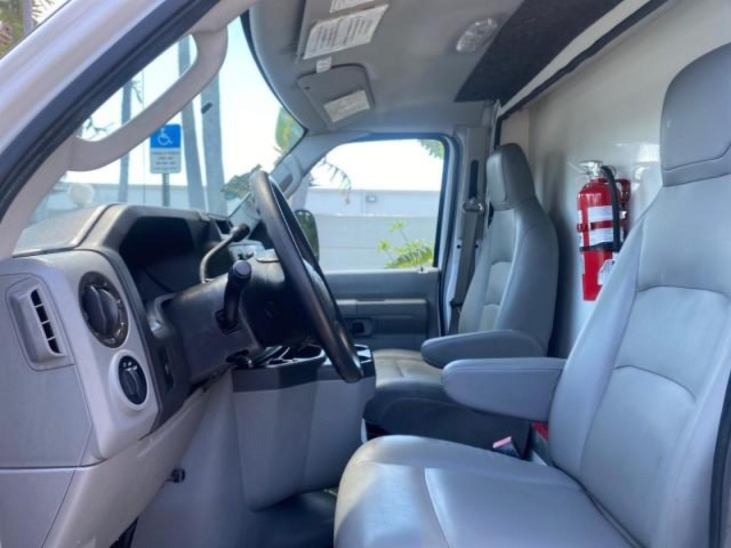2013 Oxford White /Medium Flint Ford Econoline Commercial Cutaway 1 OWNER E 450 BOX TRUCK (1FDXE4FS4DD) with an 6.8L SOHC EFI Triton V10 Engine engine, Automatic transmission, located at 4701 North Dixie Hwy, Pompano Beach, FL, 33064, (954) 422-2889, 26.240938, -80.123474 - OUR WEBPAGE FLORIDACARS1.COM HAS OVER 100 PHOTOS AND FREE CARFAX LINK 2013 Ford Econoline Super Duty E-450 BOX TRUCK 1 OWNER 17 FT DUAL REAR WHEELS HEAVY DUTY POWER LIFT GATE VIN:1FDXE4FS4DDA91512 Cutaway 6.8L V10 F SOHC 20V Gasoline Rear Wheel Drive Features ABS Brakes Air Conditioning AM/FM Stereo - Photo#46