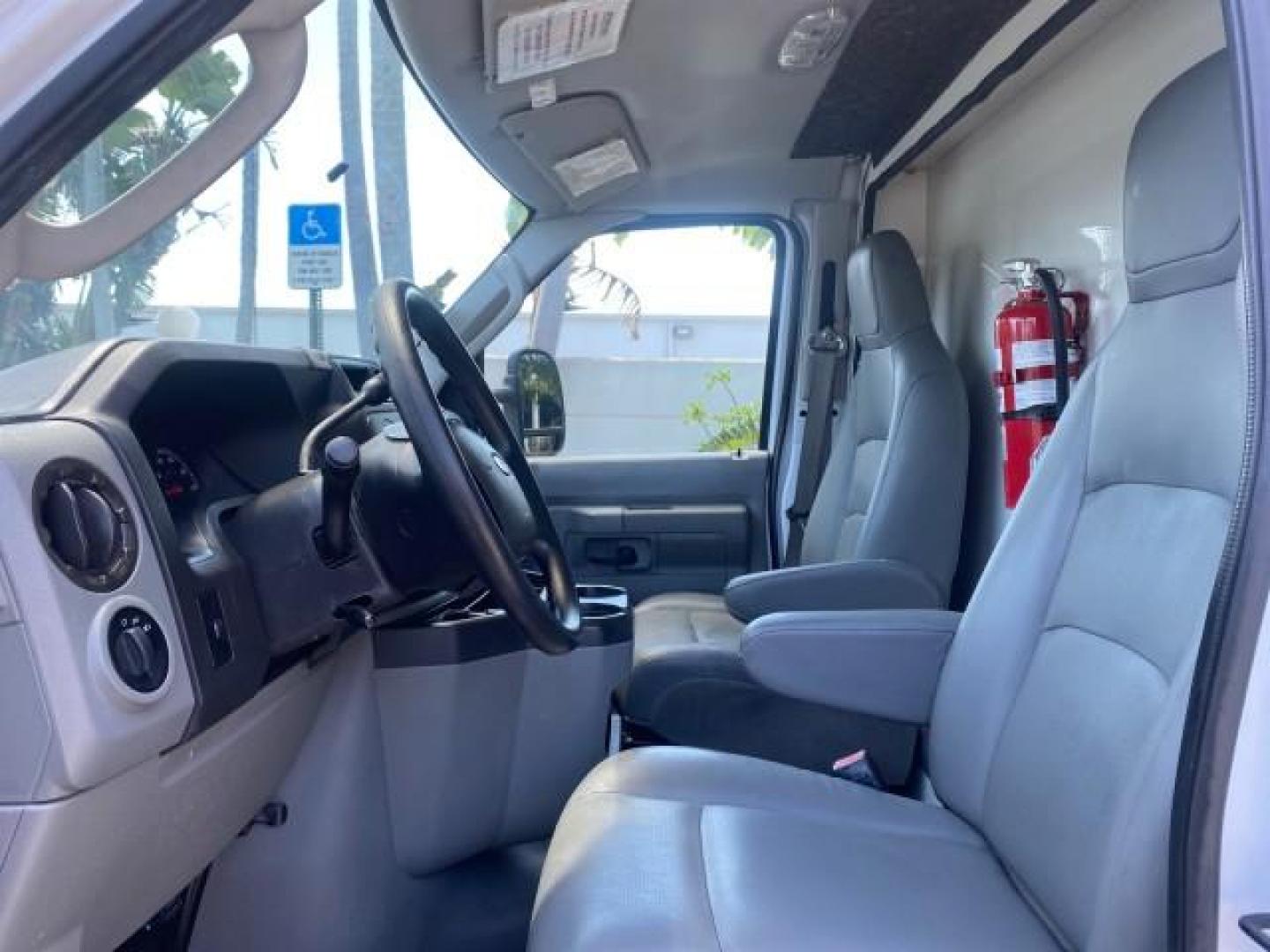 2013 Oxford White /Medium Flint Ford Econoline Commercial Cutaway 1 OWNER E 450 BOX TRUCK (1FDXE4FS4DD) with an 6.8L SOHC EFI Triton V10 Engine engine, Automatic transmission, located at 4701 North Dixie Hwy, Pompano Beach, FL, 33064, (954) 422-2889, 26.240938, -80.123474 - OUR WEBPAGE FLORIDACARS1.COM HAS OVER 100 PHOTOS AND FREE CARFAX LINK 2013 Ford Econoline Super Duty E-450 BOX TRUCK 1 OWNER 17 FT DUAL REAR WHEELS HEAVY DUTY POWER LIFT GATE VIN:1FDXE4FS4DDA91512 Cutaway 6.8L V10 F SOHC 20V Gasoline Rear Wheel Drive Features ABS Brakes Air Conditioning AM/FM Stereo - Photo#47