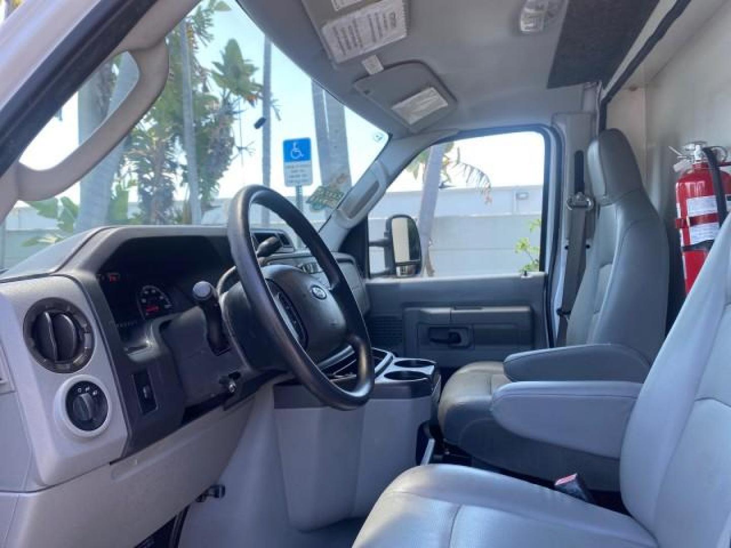 2013 Oxford White /Medium Flint Ford Econoline Commercial Cutaway 1 OWNER E 450 BOX TRUCK (1FDXE4FS4DD) with an 6.8L SOHC EFI Triton V10 Engine engine, Automatic transmission, located at 4701 North Dixie Hwy, Pompano Beach, FL, 33064, (954) 422-2889, 26.240938, -80.123474 - OUR WEBPAGE FLORIDACARS1.COM HAS OVER 100 PHOTOS AND FREE CARFAX LINK 2013 Ford Econoline Super Duty E-450 BOX TRUCK 1 OWNER 17 FT DUAL REAR WHEELS HEAVY DUTY POWER LIFT GATE VIN:1FDXE4FS4DDA91512 Cutaway 6.8L V10 F SOHC 20V Gasoline Rear Wheel Drive Features ABS Brakes Air Conditioning AM/FM Stereo - Photo#48