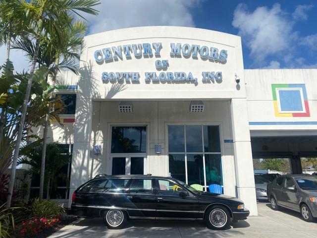 1993 Black /Red Chevrolet Caprice Classic STATON WAGON 1 OWNER (1G1BL8375PW) with an 5.7L V8 F OHV 16V engine, Automatic transmission, located at 4701 North Dixie Hwy, Pompano Beach, FL, 33064, (954) 422-2889, 26.240938, -80.123474 - OUR WEBPAGE FLORIDACARS1.COM HAS OVER 100 PHOTOS AND FREE CARFAX LINK 1993 Chevrolet Caprice -1 OWNER STATION WAGON REAR JUMP SEAT INCLUDED - NO ACCIDENTS EVER - VERY HARD COLOR COMBO TO FIND BLACK EXTERIOR RED INTERIOR Wagon 4 DR 5.7L V8 F OHV 16V Gasoline Rear Wheel Drive Features ABS Brakes Air C - Photo#0