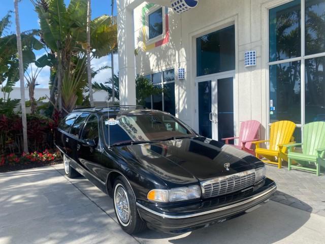 1993 Black /Red Chevrolet Caprice Classic STATON WAGON 1 OWNER (1G1BL8375PW) with an 5.7L V8 F OHV 16V engine, Automatic transmission, located at 4701 North Dixie Hwy, Pompano Beach, FL, 33064, (954) 422-2889, 26.240938, -80.123474 - OUR WEBPAGE FLORIDACARS1.COM HAS OVER 100 PHOTOS AND FREE CARFAX LINK 1993 Chevrolet Caprice -1 OWNER STATION WAGON REAR JUMP SEAT INCLUDED - NO ACCIDENTS EVER - VERY HARD COLOR COMBO TO FIND BLACK EXTERIOR RED INTERIOR Wagon 4 DR 5.7L V8 F OHV 16V Gasoline Rear Wheel Drive Features ABS Brakes Air C - Photo#1
