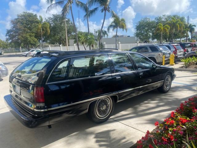 1993 Black /Red Chevrolet Caprice Classic STATON WAGON 1 OWNER (1G1BL8375PW) with an 5.7L V8 F OHV 16V engine, Automatic transmission, located at 4701 North Dixie Hwy, Pompano Beach, FL, 33064, (954) 422-2889, 26.240938, -80.123474 - OUR WEBPAGE FLORIDACARS1.COM HAS OVER 100 PHOTOS AND FREE CARFAX LINK 1993 Chevrolet Caprice -1 OWNER STATION WAGON REAR JUMP SEAT INCLUDED - NO ACCIDENTS EVER - VERY HARD COLOR COMBO TO FIND BLACK EXTERIOR RED INTERIOR Wagon 4 DR 5.7L V8 F OHV 16V Gasoline Rear Wheel Drive Features ABS Brakes Air C - Photo#7