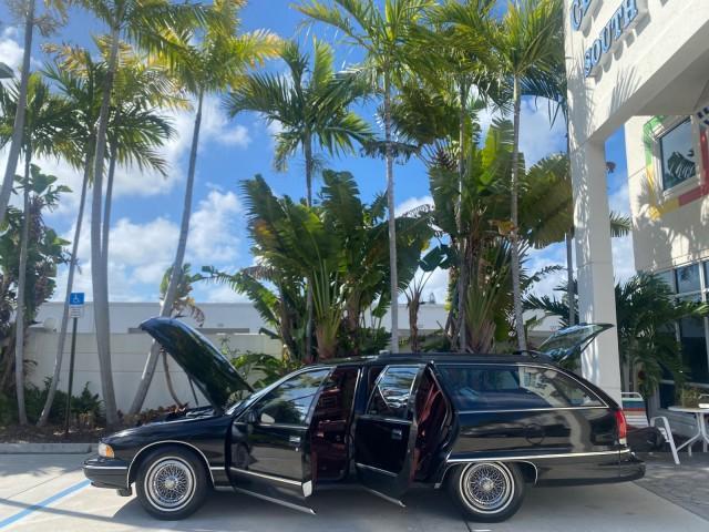 1993 Black /Red Chevrolet Caprice Classic STATON WAGON 1 OWNER (1G1BL8375PW) with an 5.7L V8 F OHV 16V engine, Automatic transmission, located at 4701 North Dixie Hwy, Pompano Beach, FL, 33064, (954) 422-2889, 26.240938, -80.123474 - OUR WEBPAGE FLORIDACARS1.COM HAS OVER 100 PHOTOS AND FREE CARFAX LINK 1993 Chevrolet Caprice -1 OWNER STATION WAGON REAR JUMP SEAT INCLUDED - NO ACCIDENTS EVER - VERY HARD COLOR COMBO TO FIND BLACK EXTERIOR RED INTERIOR Wagon 4 DR 5.7L V8 F OHV 16V Gasoline Rear Wheel Drive Features ABS Brakes Air C - Photo#8