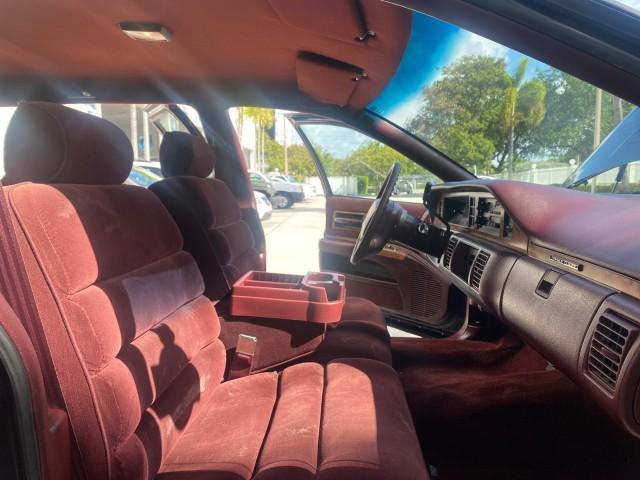1993 Black /Red Chevrolet Caprice Classic STATON WAGON 1 OWNER (1G1BL8375PW) with an 5.7L V8 F OHV 16V engine, Automatic transmission, located at 4701 North Dixie Hwy, Pompano Beach, FL, 33064, (954) 422-2889, 26.240938, -80.123474 - OUR WEBPAGE FLORIDACARS1.COM HAS OVER 100 PHOTOS AND FREE CARFAX LINK 1993 Chevrolet Caprice -1 OWNER STATION WAGON REAR JUMP SEAT INCLUDED - NO ACCIDENTS EVER - VERY HARD COLOR COMBO TO FIND BLACK EXTERIOR RED INTERIOR Wagon 4 DR 5.7L V8 F OHV 16V Gasoline Rear Wheel Drive Features ABS Brakes Air C - Photo#12