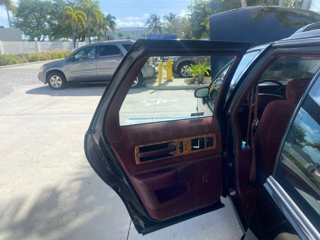 1993 Black /Red Chevrolet Caprice Classic STATON WAGON 1 OWNER (1G1BL8375PW) with an 5.7L V8 F OHV 16V engine, Automatic transmission, located at 4701 North Dixie Hwy, Pompano Beach, FL, 33064, (954) 422-2889, 26.240938, -80.123474 - OUR WEBPAGE FLORIDACARS1.COM HAS OVER 100 PHOTOS AND FREE CARFAX LINK 1993 Chevrolet Caprice -1 OWNER STATION WAGON REAR JUMP SEAT INCLUDED - NO ACCIDENTS EVER - VERY HARD COLOR COMBO TO FIND BLACK EXTERIOR RED INTERIOR Wagon 4 DR 5.7L V8 F OHV 16V Gasoline Rear Wheel Drive Features ABS Brakes Air C - Photo#13