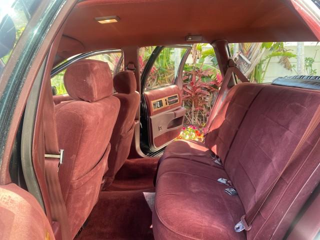1993 Black /Red Chevrolet Caprice Classic STATON WAGON 1 OWNER (1G1BL8375PW) with an 5.7L V8 F OHV 16V engine, Automatic transmission, located at 4701 North Dixie Hwy, Pompano Beach, FL, 33064, (954) 422-2889, 26.240938, -80.123474 - OUR WEBPAGE FLORIDACARS1.COM HAS OVER 100 PHOTOS AND FREE CARFAX LINK 1993 Chevrolet Caprice -1 OWNER STATION WAGON REAR JUMP SEAT INCLUDED - NO ACCIDENTS EVER - VERY HARD COLOR COMBO TO FIND BLACK EXTERIOR RED INTERIOR Wagon 4 DR 5.7L V8 F OHV 16V Gasoline Rear Wheel Drive Features ABS Brakes Air C - Photo#14